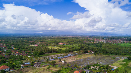 Fototapeta na wymiar Aerial view of beautiful and freshly planted rice terraces in rainy season.