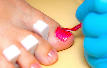 The Master does a pedicure in a beauty salon