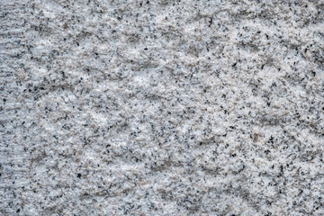 Gray rugged granite textute. Gray stone texture.