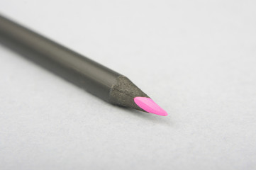 Pencil isolated on the gray background
