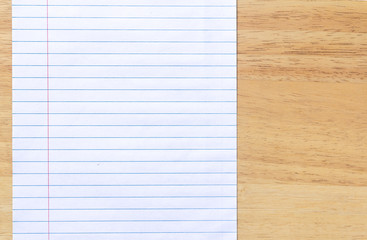 Notebook Lined Paper on wood  desk Background