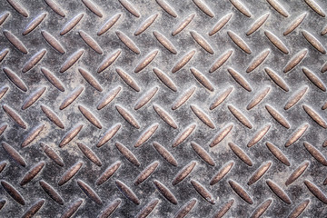 Old and grunge diamond plate or metal steel floor background