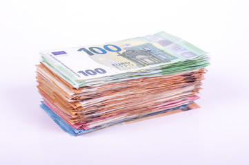 Pile of Euro banknotes isolated on the white background