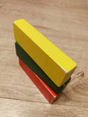 Lithuania flag constructed from wooden blocks as a toys