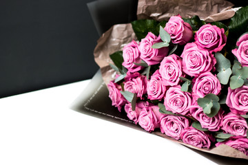 image of a bouquet of fresh pink roses on a white background