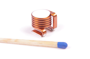 High power SMD coil in comparison with match head