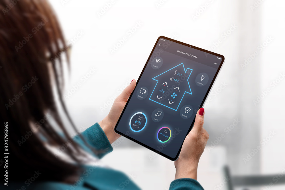 Poster smart home central control system on tablet display. concept app design in woman hands. home interio