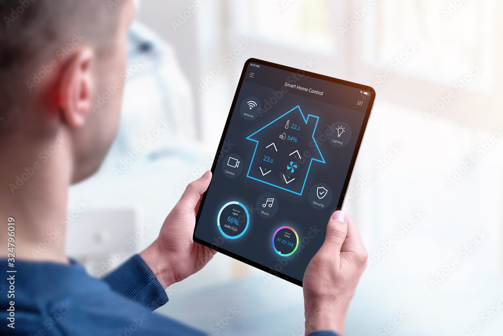 Poster man holding smart home control tablet with modern app concept