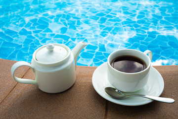 tea set on plate near spa pool