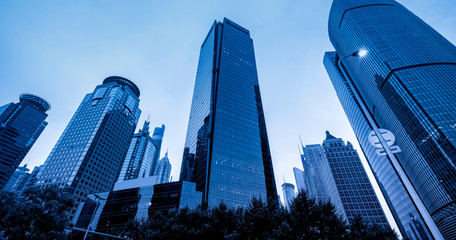 Fototapeta na wymiar Office building in Lujiazui Business District of Shanghai in blue..