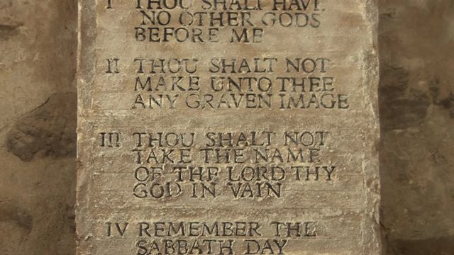 10 Commandments from the Bible which God tells Moses to write the Ten rules on Tablets of stone. Tilt shot - Stock Video Clip Footage