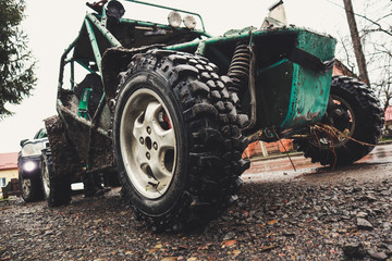 Homemade buggy machine stuck in the swamp. Offroad trip to the mountains.