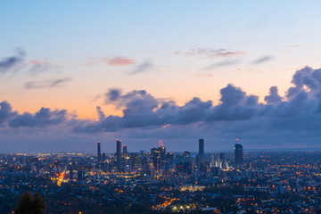 Naklejka na ściany i meble Brisbane skyline view at dawn with cloudy sky.
