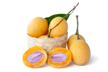 Cut half and whole ripe Marian Plum or Plum Mango Thai people call Ma Prang isolated on white background.