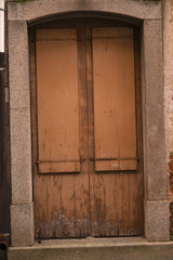 old door of a ruined home