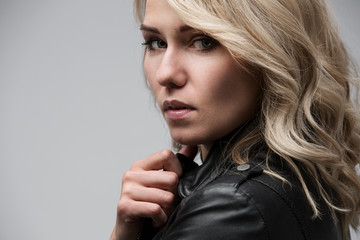 Portrait of a beautiful serious young woman. Close-up.