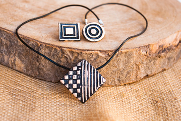 Geometric fashion jewelry set of polymer clay. Handmade necklace and earrings.