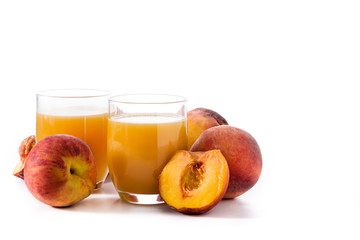 Peach juice in glass isolated on white background. Copy space