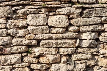 Closeup of a typical dry stone wall in the countryside, Veneto region, Italy, Europe