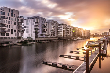 Fototapeta premium sunset over Frankfurt Westhafen, apartment view