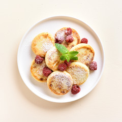 Cottage cheese pancakes with fresh raspberries