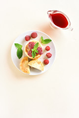 Cottage cheese pancakes with fresh raspberries