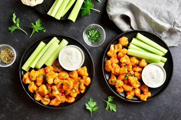  Cauliflower buffalo wings with celery and sauce © voltan