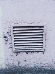 Ventilation on the street. Pink wall