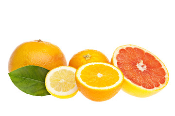 Fototapeta na wymiar Isolated citrus fruits. Pieces of lemon, lime, pink grapefruit and orange isolated on white background, with clipping path