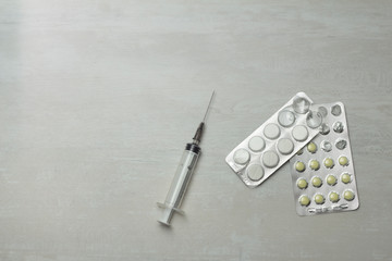 medical pills and syringe