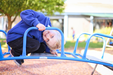 Child at preschool posing for kindergarten photos