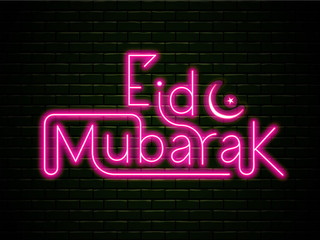 Fototapeta na wymiar Neon Effect Pink Eid Mubarak Font with Crescent Moon and Star on Brick Wall Background.