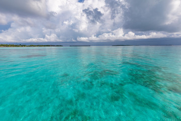 Beautiful sea and cloudy sky. Tropical seascape with endless horizon