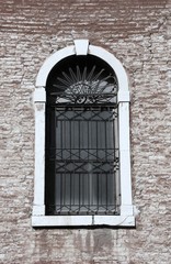 Old window in Venice Italy. Retro filtered colors style.