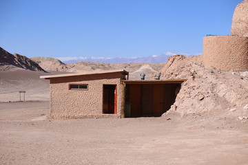 Small building for tourists reception in the Atacama desert, Luna Valley in Chile. Refuge in the middle of nowhere.