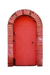 Old iron door in arched brick wall