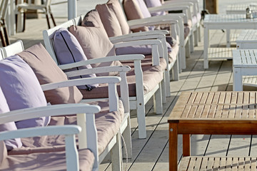 tables and chairs in the open air, cafe, restaurant