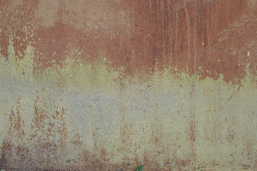 Old rusty and battered metal background