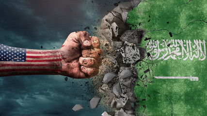 Fist breaking rock. USA destroying Saudi Arabia