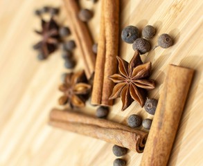 Cooking background, Star anise with cinnamon rolls and sweet peppers