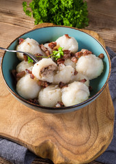 Meat stuffed potato dumplings.
