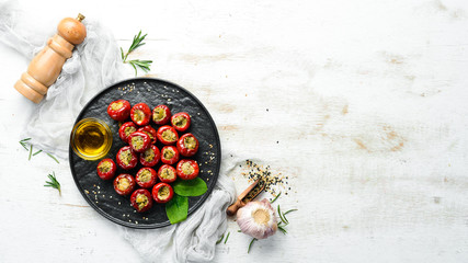 Pickled peppers stuffed with capers. Italian traditional dish. Top view. Free space for your text.