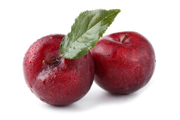 Plums with leaf