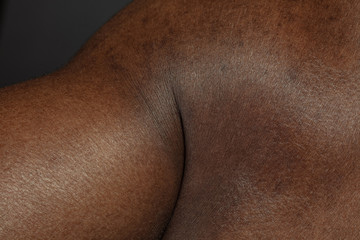 Hand. Detailed texture of human skin. Close up shot of young african-american male body. Skincare, bodycare, healthcare, hygiene and medicine concept. Looks beauty and well-kept. Dermatology.