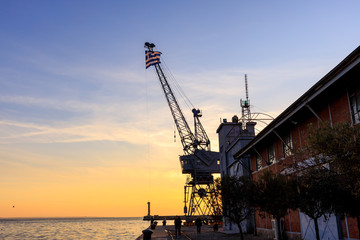 port at sea at sunset