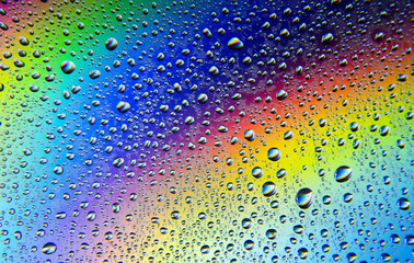 blue water drops on glass