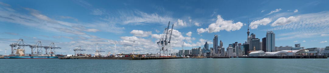 Fototapeta na wymiar Skyline Auckland New Zealand. Boats and cranes panorama