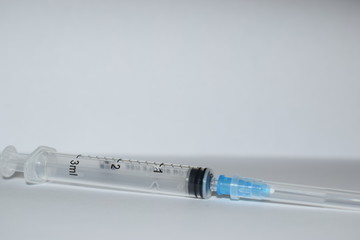syringe on a black background
