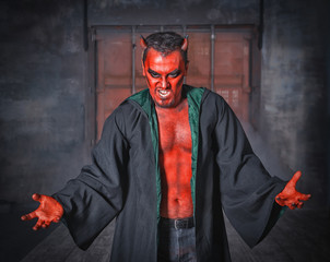 Terrible devil man. Scary Halloween scene