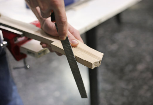 instrument making - close up of a man making musical instruments - traditional greek baglamas - a plucked string instrument in Greece 